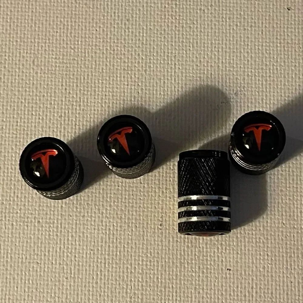 Tesla valve Stem caps in Black set of 4 NWT